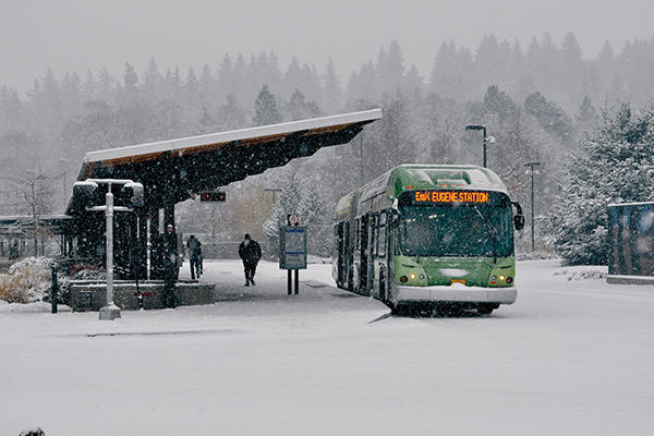 bus at station in the snow