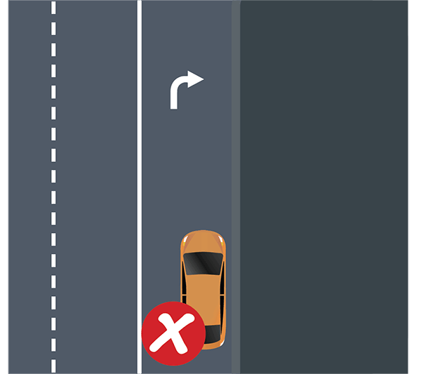 cars shouldn't stay in the bus lane even to make a turn.
