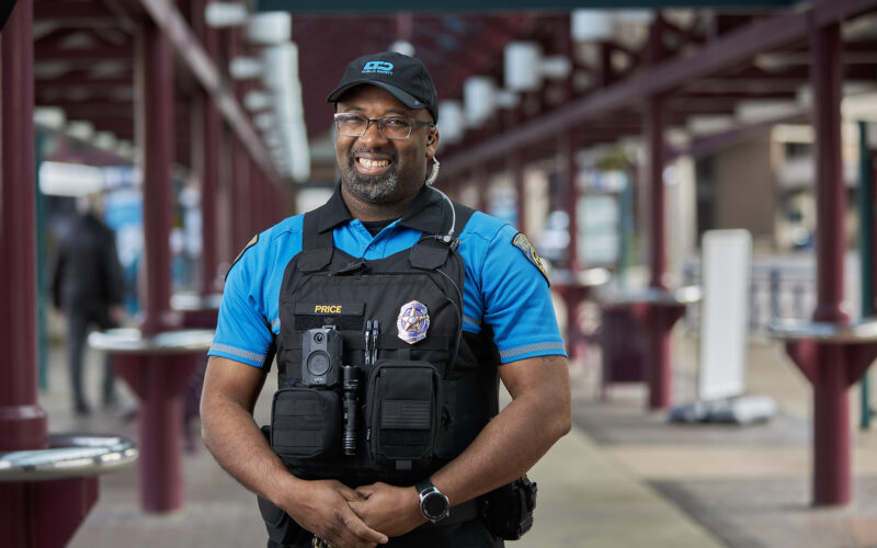 security officer standing at a bus station